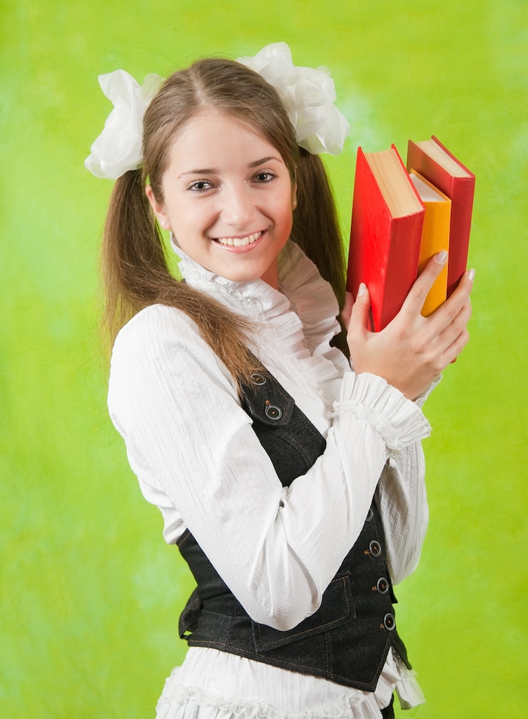 Kostenlose Foto mädchen mit büchern