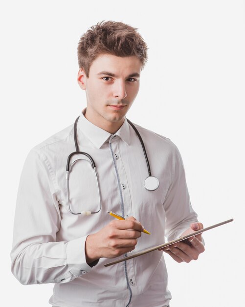 Männlicher Arzt mit Tablette