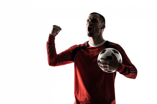 Mann Fußball Fußball Spieler Silhouette im Studio isoliert auf weißen Ständen mit einem Ball Sieg