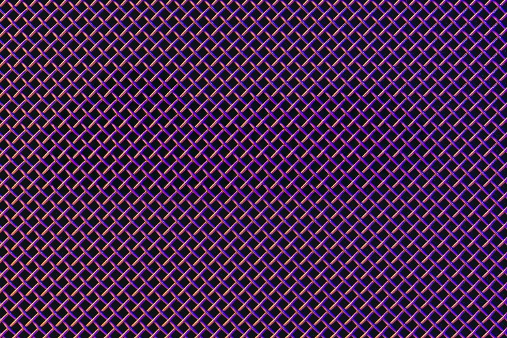 Kostenlose Foto metallgrill-close-up-textur eines musiklautsprechers in farbiger beleuchtung