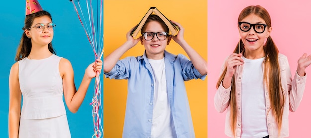 Kostenloses Foto mittlere aufnahmen von menschen mit brille, die im studio posieren