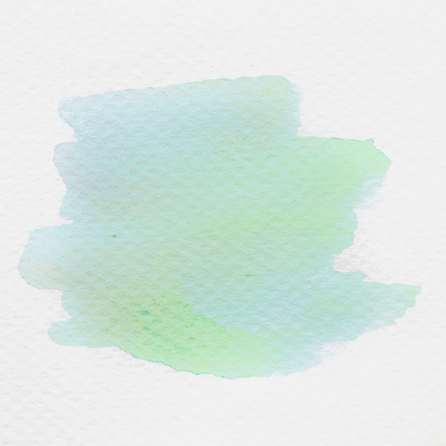 Nahaufnahme des grünen Aquarells auf weißem Segeltuchpapier