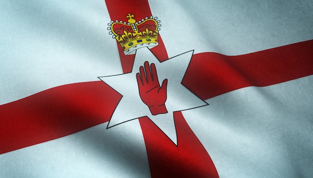 Nahaufnahmeaufnahme der wehenden Flagge von Nordirland mit interessanten Texturen