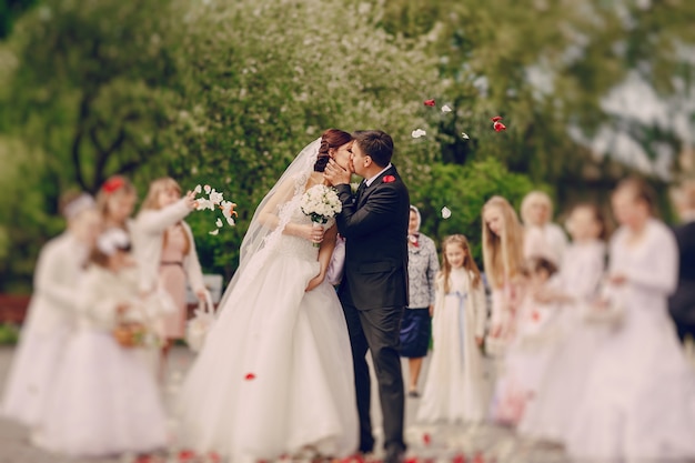 Newlyweds kissing