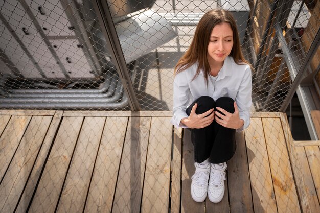 Person, die unter Mobbing leidet