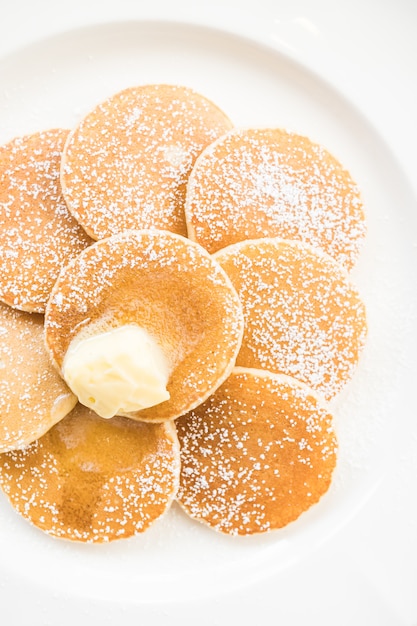 Pfannkuchen mit Butter an der Spitze