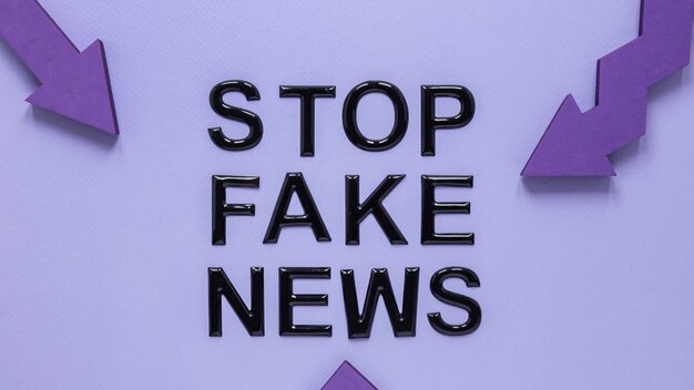 Pfeile, die auf Stop Fake News zeigen