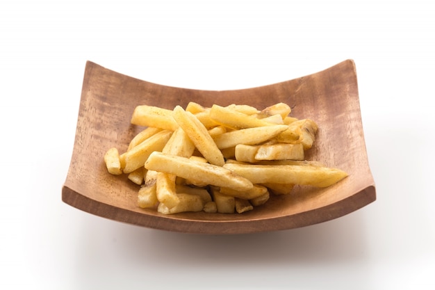 Pommes frites auf Holzplatte