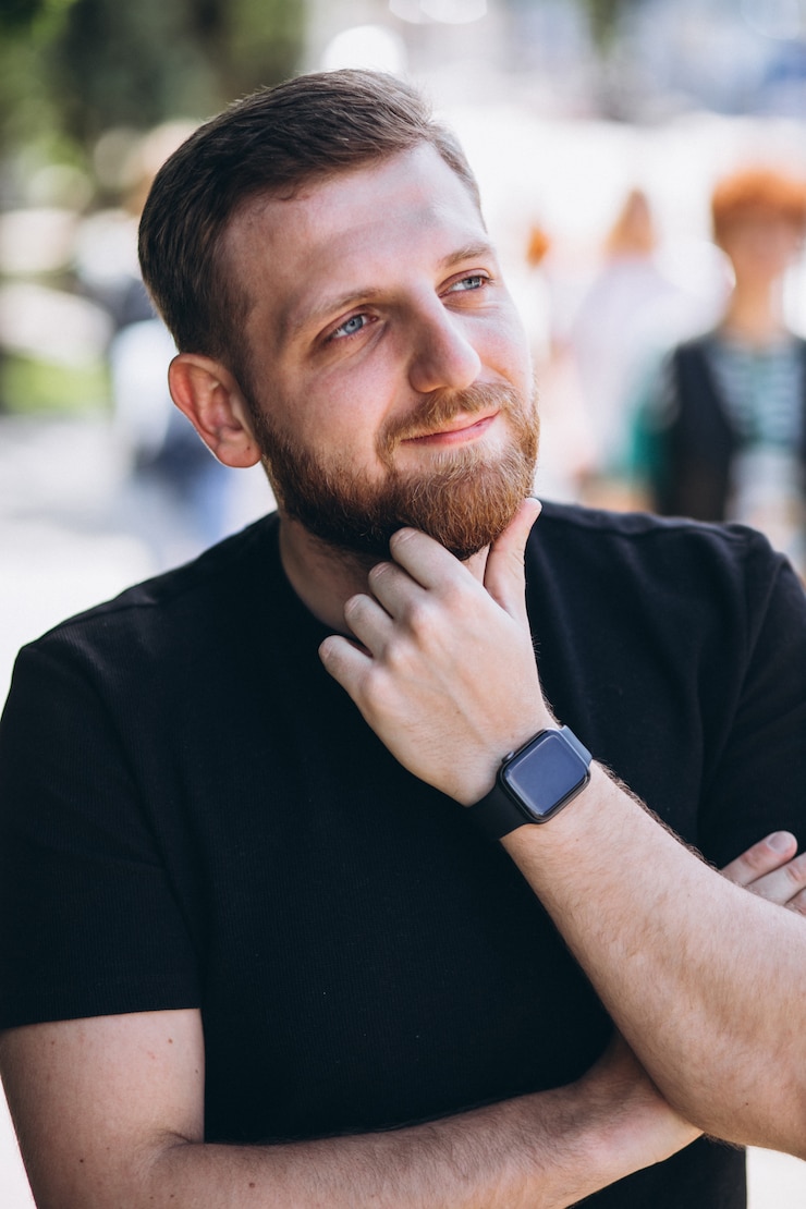Kostenlose Foto porträt eines jungen, hübschen mannes