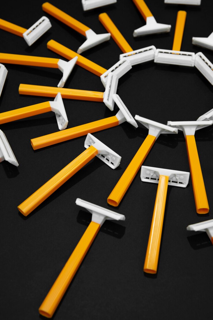 Kostenlose Foto rasiermesser mit schwarzem hintergrund