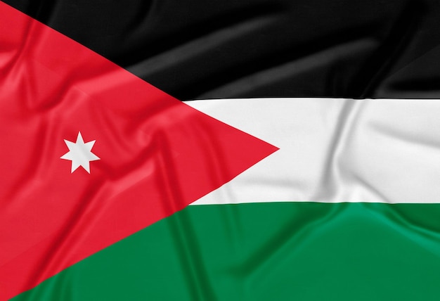 Realistischer hintergrund der jordanischen flagge