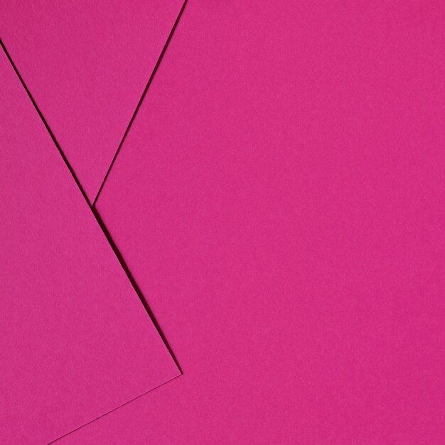 Rosa abstrakter Hintergrund spornte durch materielles Design unter Verwendung der Pappe und des Papiers an