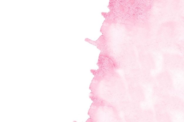 Kostenloses Foto rosa aquarellfleck in einem eckhintergrund