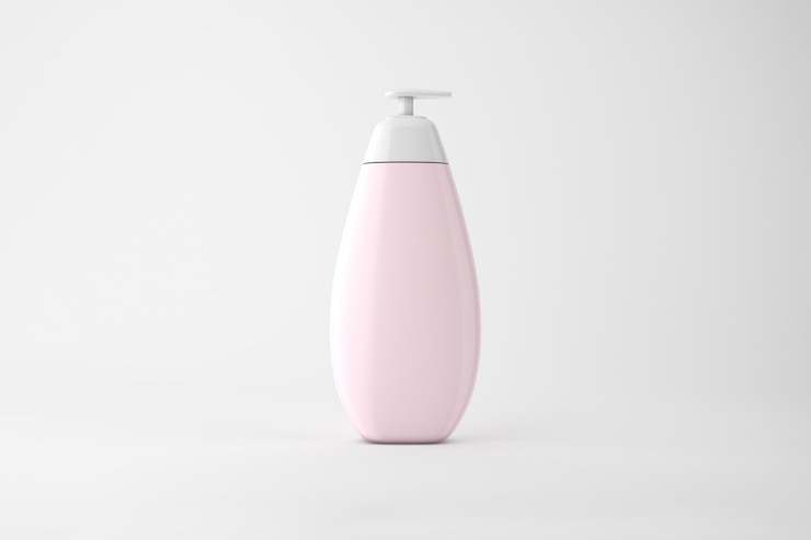 Kostenlose Foto rosa flasche mit pump für körperpflegeprodukte