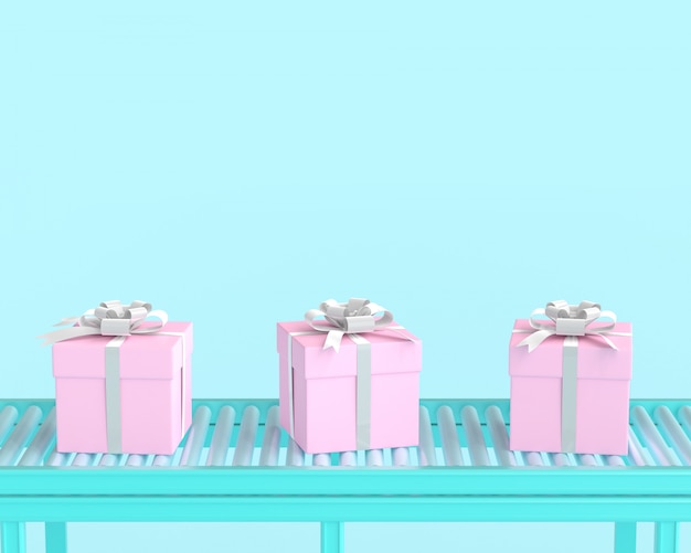 Rosa geschenkbox auf förderrolle und blauem pastellfarbhintergrund.