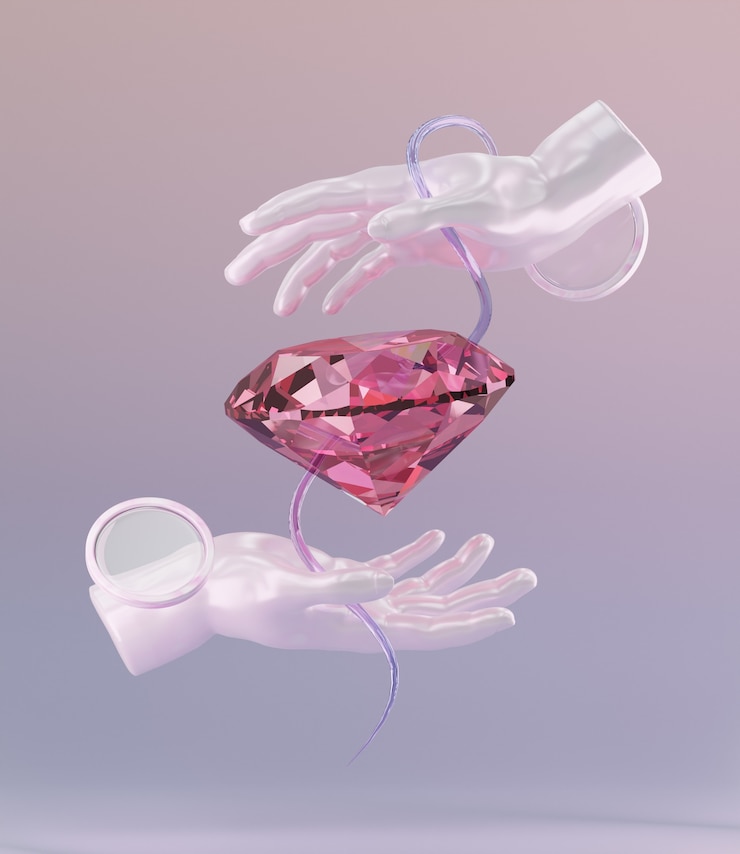 Kostenlose Foto rosafarbener diamant mit handhintergrund