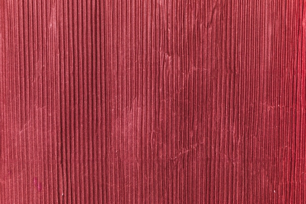 Roter Papierbeschaffenheitshintergrund