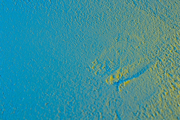 Sandhintergrund in den blauen Schatten