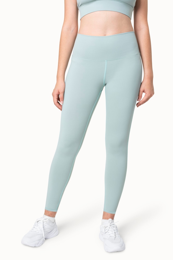 Kostenlose Foto schlichte blaue yogahosen sportbekleidung