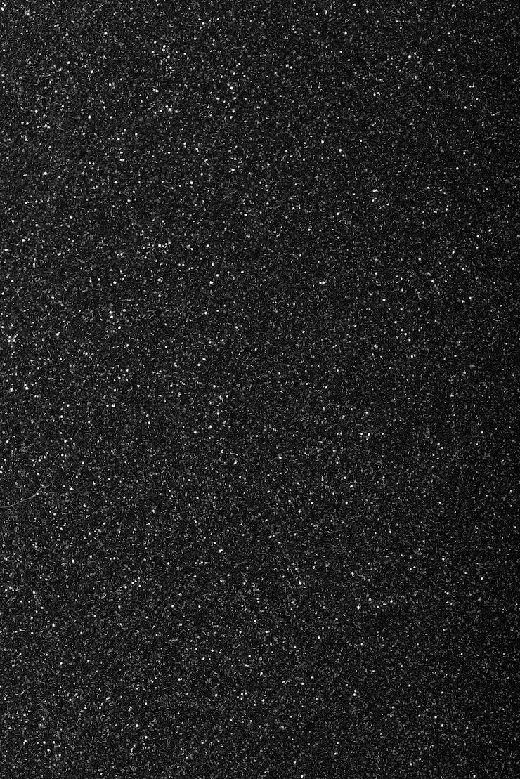 Kostenlose Foto schwarzer hintergrund mit defokussiertem glitter