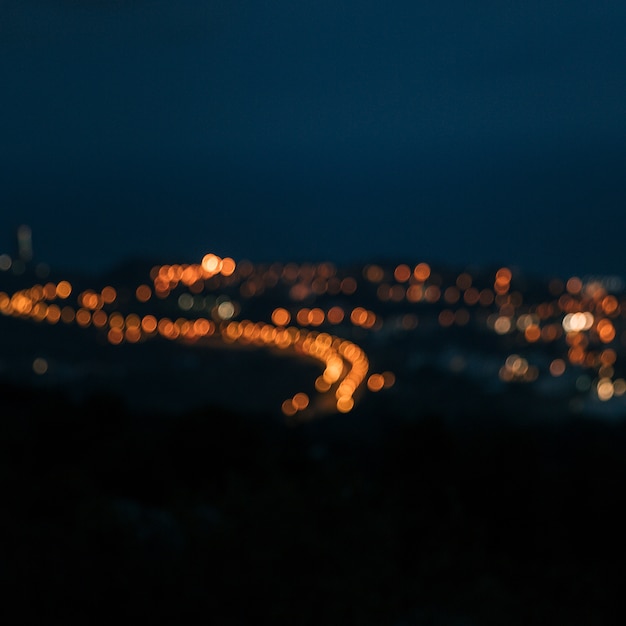 Stadtlichter am abend verwischender hintergrund Premium Fotos