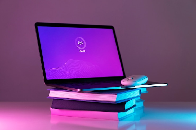 Kostenlose Foto stillleben mit büchern versus technik