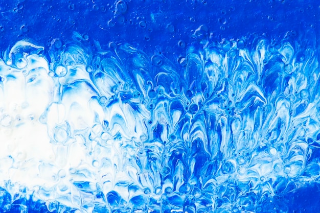 Strukturierter Hintergrund mit blauer und weißer Ölfarbe