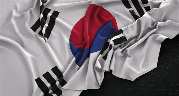 Südkorea-Flagge geknickt auf dunklem Hintergrund 3D Render