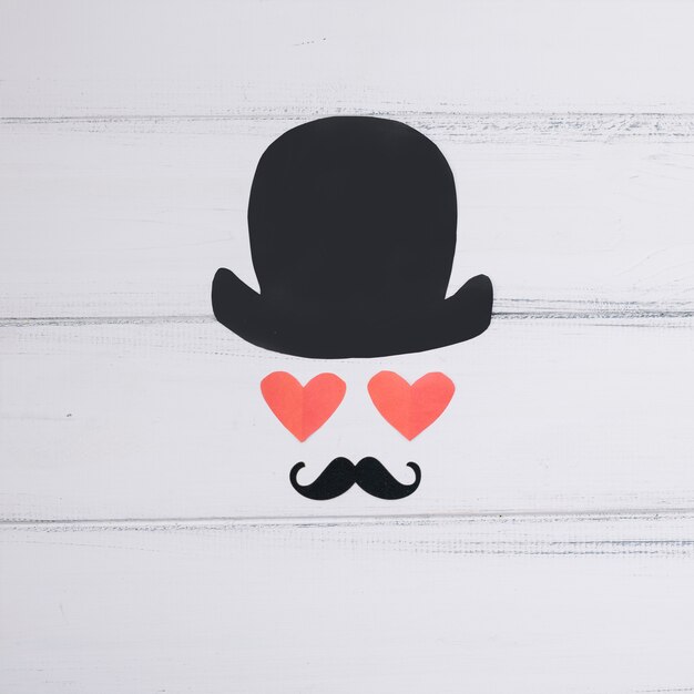 Symbol des Mannes der Papierherzen und des dekorativen Schnurrbartes