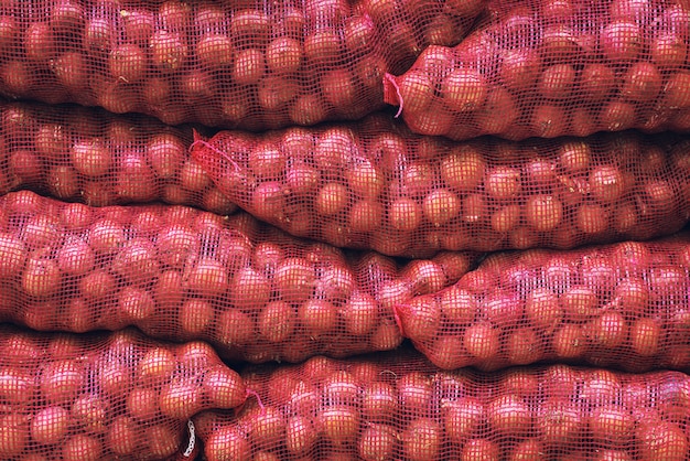 Kostenloses Foto taschen mit roten zwiebeln