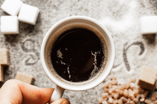 Tasse Kaffee mit Zucker