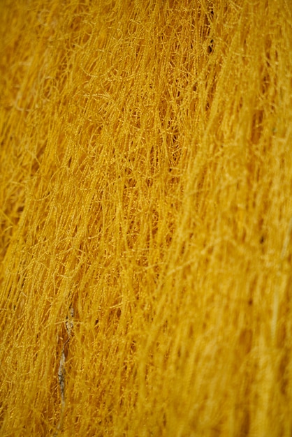 Textur der gelben Fäden