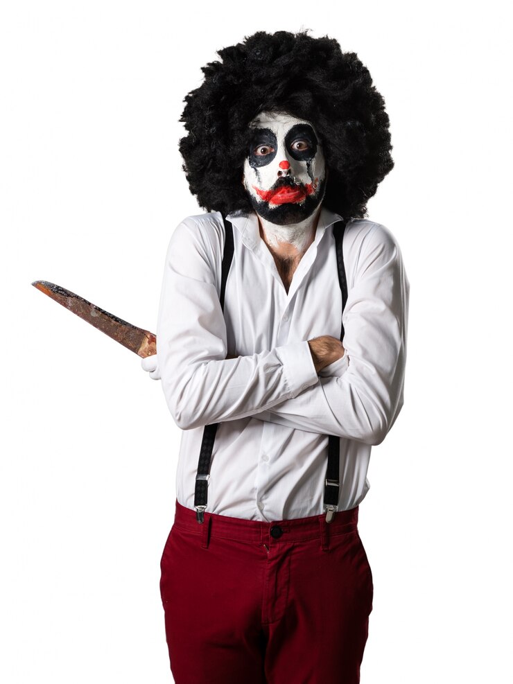 Kostenlose Foto trauriger mörder-clown mit messer