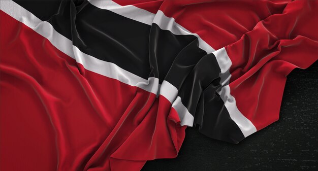 Trinidad und Tobago Fahne geknittert auf dunklem Hintergrund 3D Render