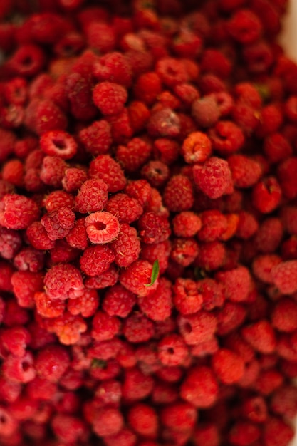 Viele helle Himbeeren. Hintergrund, Bild für Postkarte