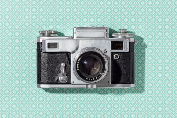 Kostenlose Foto vintage-kamera-komposition der draufsicht
