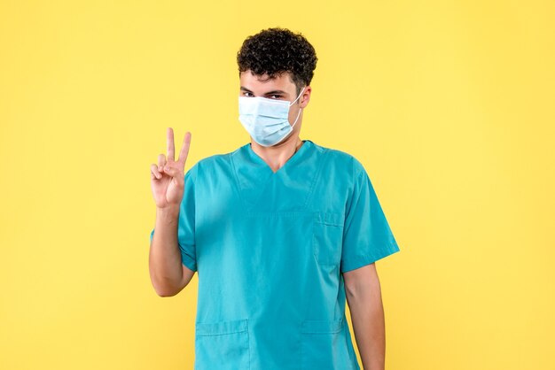 Vorderansicht Arzt Der Arzt in der Maske weiß, wie man auf Coronavirus testet