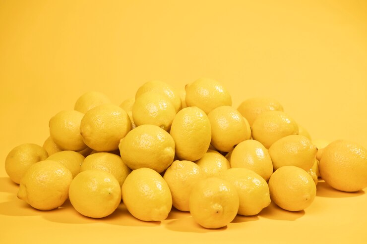 Kostenlose Foto vorderansichtbündel frische zitronen