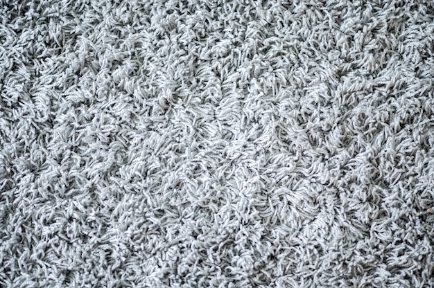 weicher weißer Teppich drinnen Hintergrund