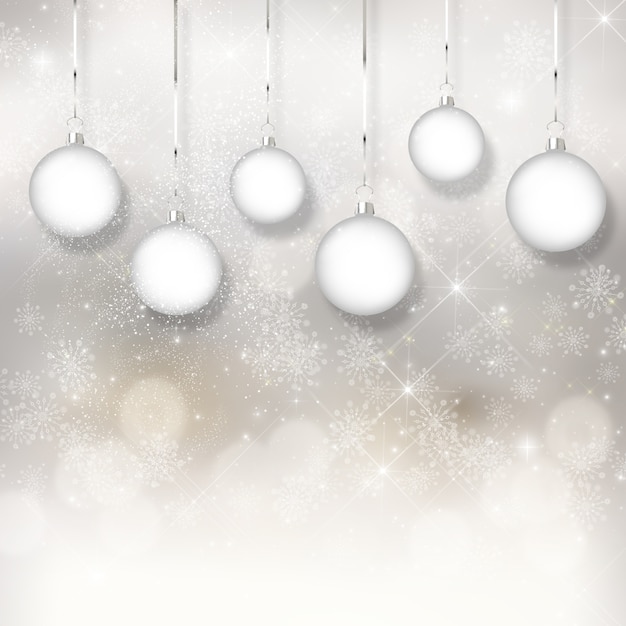 Kostenloses Foto weihnachten hintergrund mit bokeh lichter und hängende kugeln