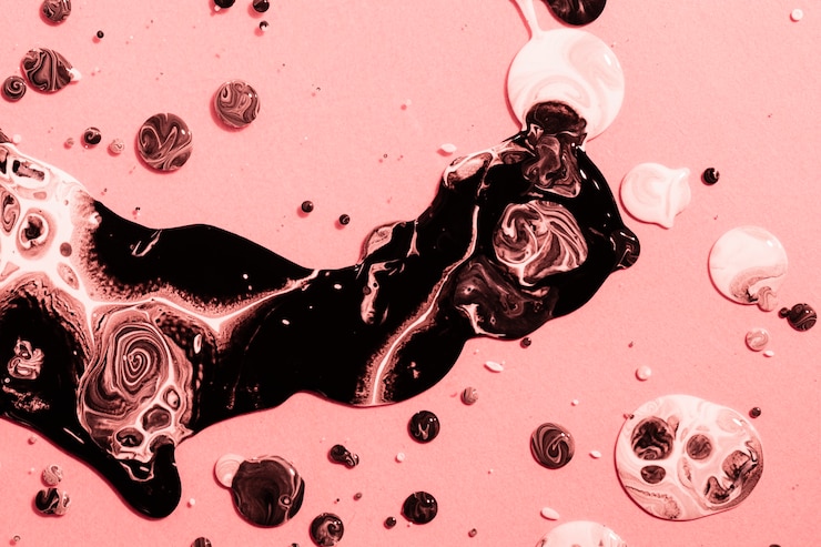 Kostenlose Foto weiße und schwarze farbe der draufsicht auf rosa hintergrund