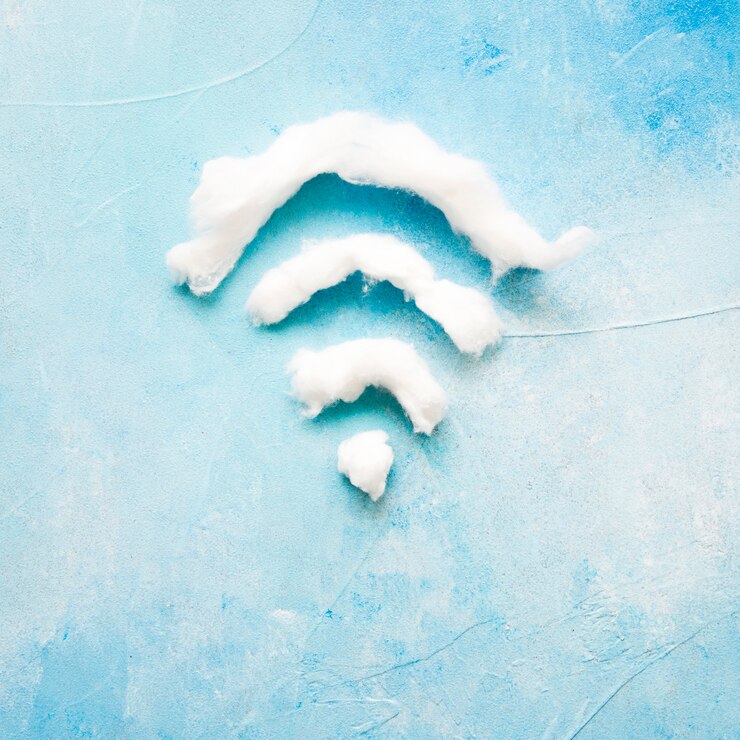Kostenlose Foto wifi-symbol aus baumwolle auf blauem hintergrund