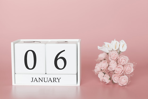 06 de enero. Día 6 del mes. Calendario cubo sobre fondo rosa moderno