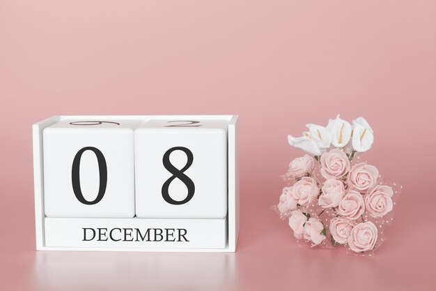 08 de dezembro. dia 8 do mês. calendar o cubo no fundo cor-de-rosa moderno, no conceito do negócio e em um evento importante.