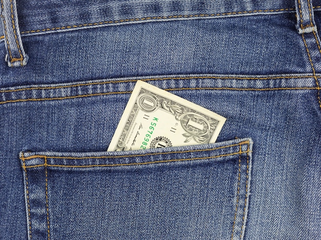 1-Dollar-Schein in Jeanstasche Nahaufnahme