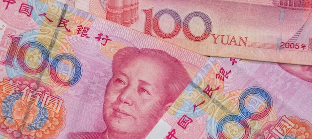 100 chinesische Währung Renminbi-Banknoten als finanzieller Hintergrund Weltwirtschaft