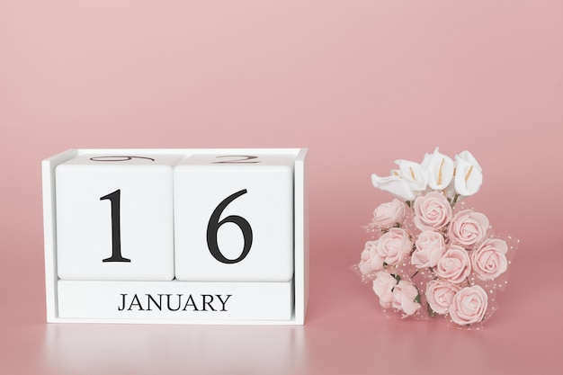 16. Januar Tag 16 des Monats. Kalenderwürfel auf modernem rosa Hintergrund
