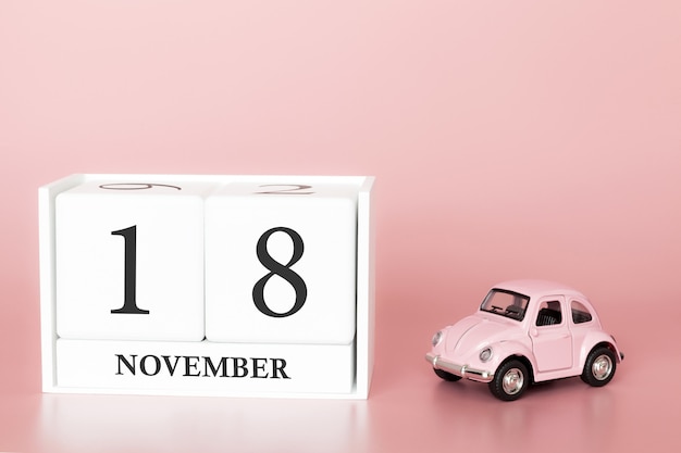 18 de noviembre. Día 18 del mes. Calendario cubo con carro