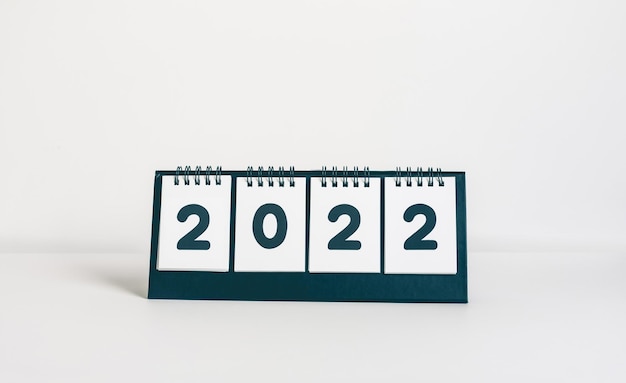 Foto 2022 conceitos de ação de metas de ano novo com texto no calendário