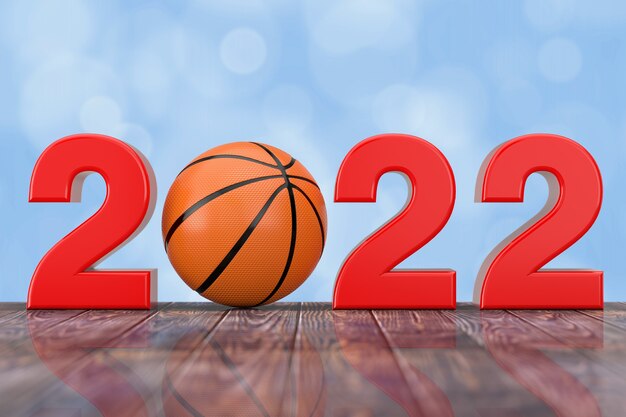 2022 neujahrsschild mit basketballball auf einem holztisch. 3d-rendering